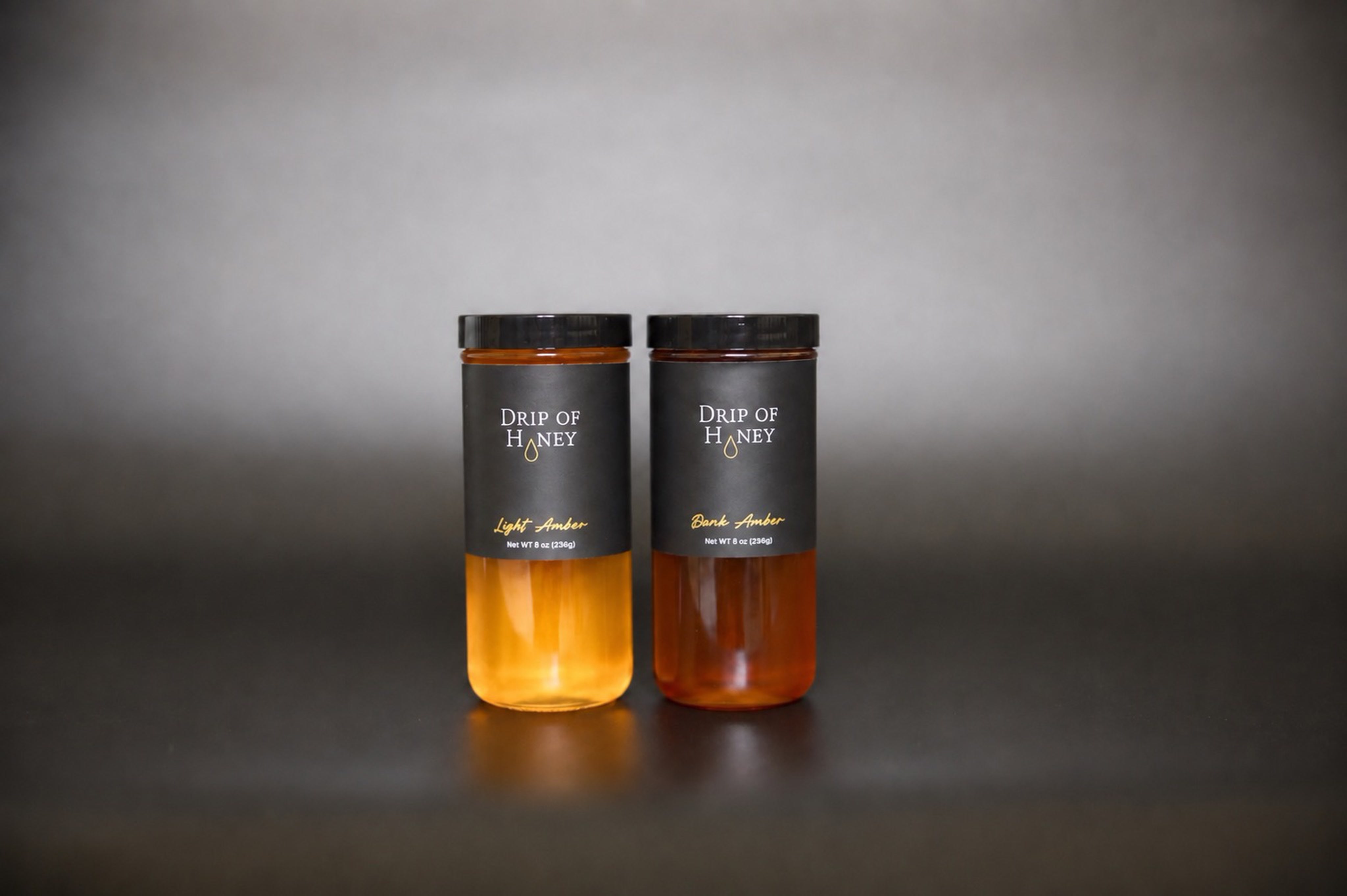 Light Amber and Dark Amber jars of Drip of Honey