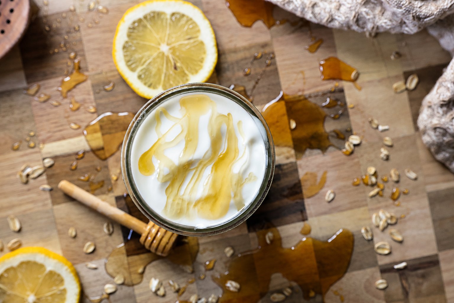 Honey drizzled over yogurt with lemon